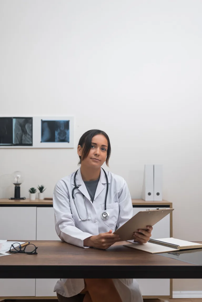 Doctor seated in a consultation room